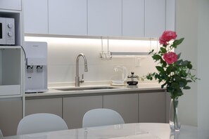 Fridge, microwave, electric kettle, toaster