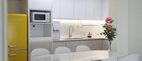 Fridge, microwave, electric kettle, toaster