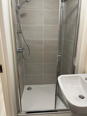 Hair dryer, towels, soap, shampoo