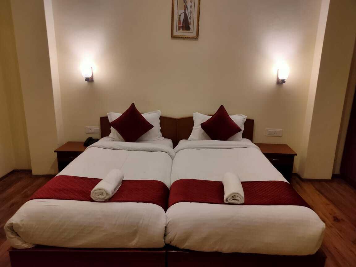 Habitación clásica con 1 cama doble o 2 individuales | Zona de estar