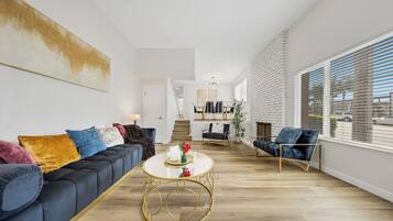 Deluxe Apartment, 3 Bedrooms, Non Smoking | Living area | 55-inch LCD TV with digital channels