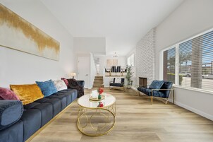 Deluxe Apartment, 3 Bedrooms, Non Smoking | Living area | 55-inch LCD TV with digital channels