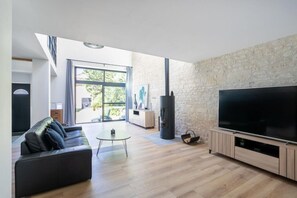 Smart TV, fireplace, foosball, offices