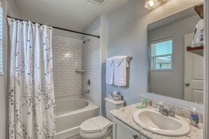 Shower, towels, soap, toilet paper