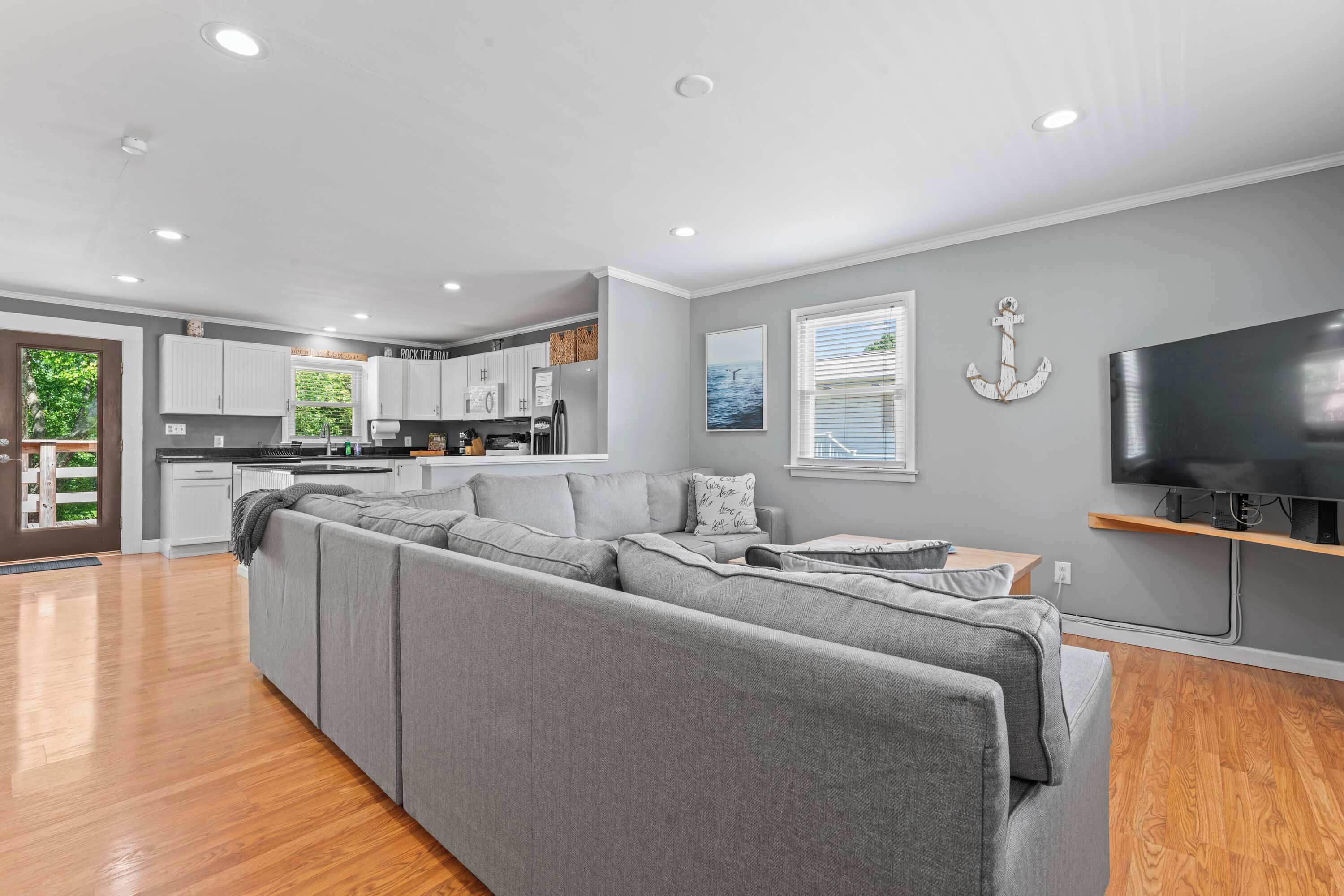 House, Multiple Beds, Patio (The Blue Bungalow) | Living area | 42-inch flat-screen TV with digital channels