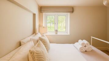 Iron/ironing board, travel crib, free WiFi, bed sheets