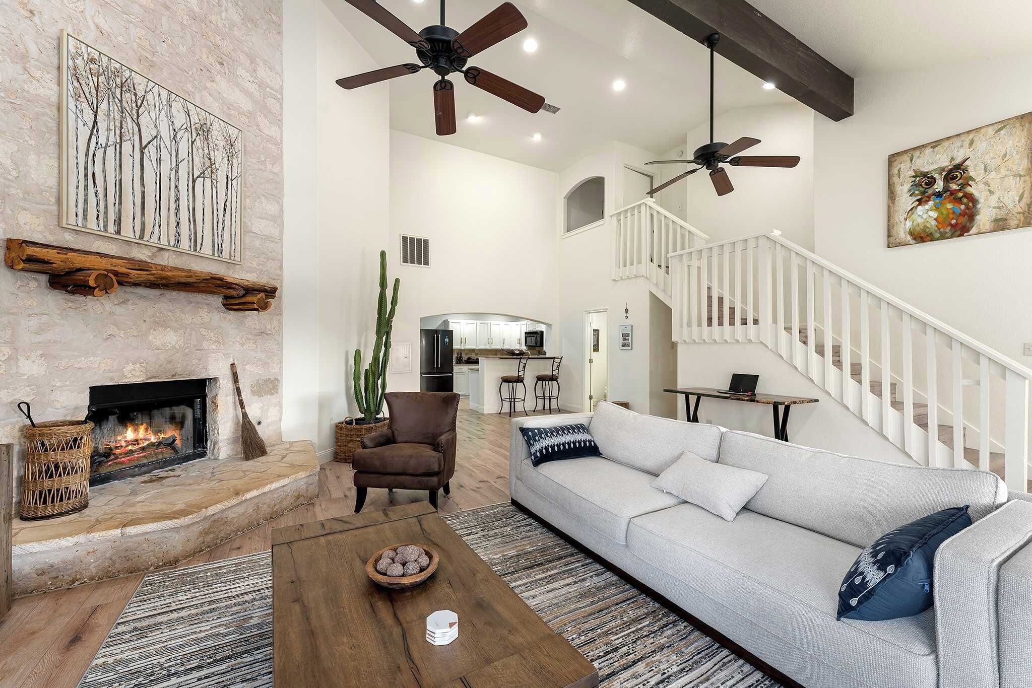 House, Multiple Beds, Patio, Garden View (Hoots Hollar Haus) | Living area | 65-inch flat-screen TV with digital channels, fireplace