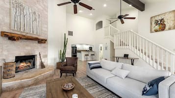 House, Multiple Beds, Patio, Garden View (Hoots Hollar Haus) | Living area | 65-inch flat-screen TV with digital channels, fireplace