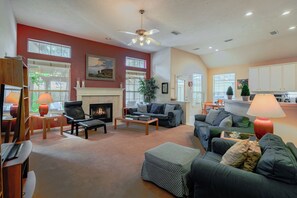 Smart TV, fireplace, books