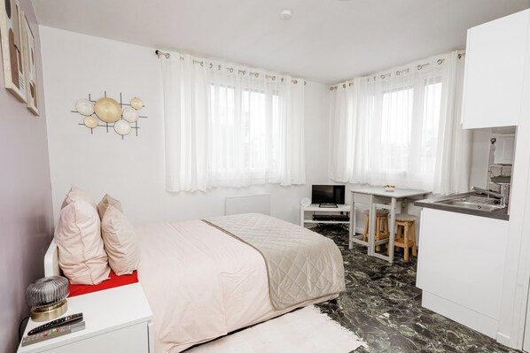 1 chambre, fer et planche à repasser, Wi-Fi, literie fournie