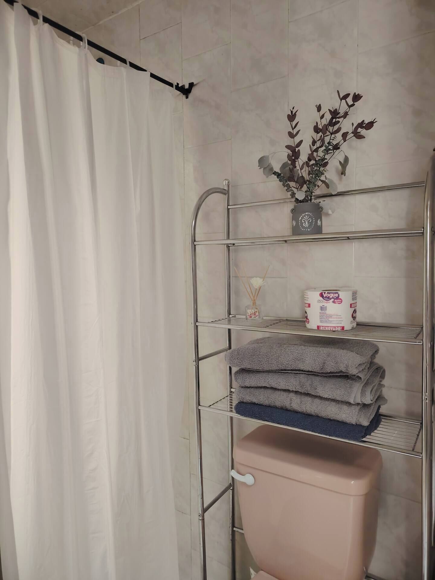 Shower, towels, soap, toilet paper