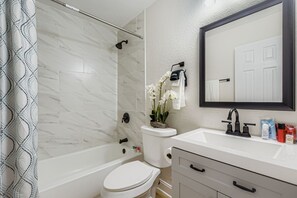 Hair dryer, towels, soap, shampoo