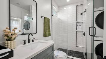 Shower, hair dryer, towels, soap