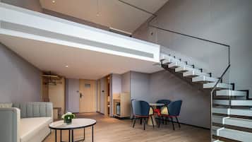 1 Bedroom Suite Sea View Penthouse | Down comforters, minibar, desk, laptop workspace