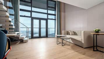 1 Bedroom Suite Sea View Penthouse | Down comforters, minibar, desk, laptop workspace