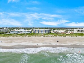 On the beach, sun loungers, beach towels - Oceanfront Top Floor Direct Views of Cocoa Beach, the Pier and Space Launches (Cocoa Beach)