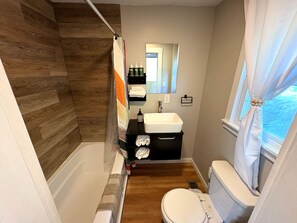 Hair dryer, towels, soap, toilet paper