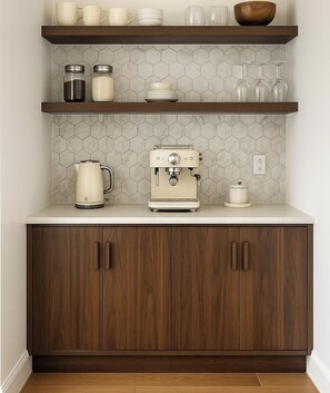 A kitchen with wooden cabinets, a coffee machine, and a tiled backsplash. - Cedar & Stone: Sauna, Swim Spa, Wellness Escape. East Austin, Outdoor Lounge, (Austin)