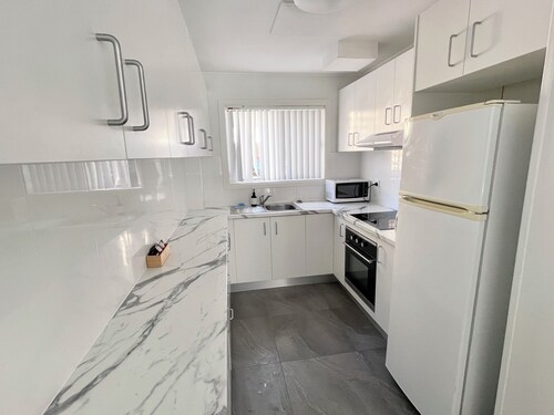 Sunrise Apt 5 · Renovated 2BR · Ground Floor +Pool