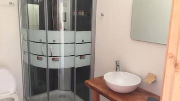 Shower, free toiletries, hair dryer, slippers