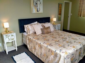 1 bedroom, desk, iron/ironing board, travel crib