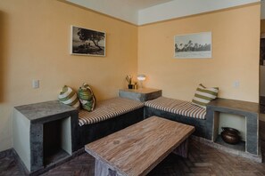 Comfort studio, uitzicht op tuin | Woonruimte
