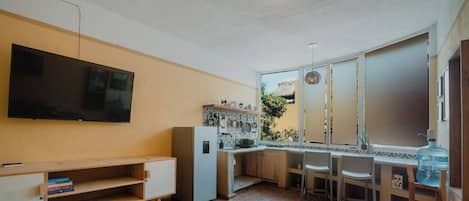 Studio – comfort, hageutsikt | Oppholdsområde