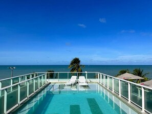 Outdoor pool - CABO BRANCO BEACHFRONT FLAT at the Green Sunset Hotel (João Pessoa)