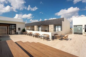 Apartment, 1 Schlafzimmer, Balkon, Meerblick | Speisen im Freien
