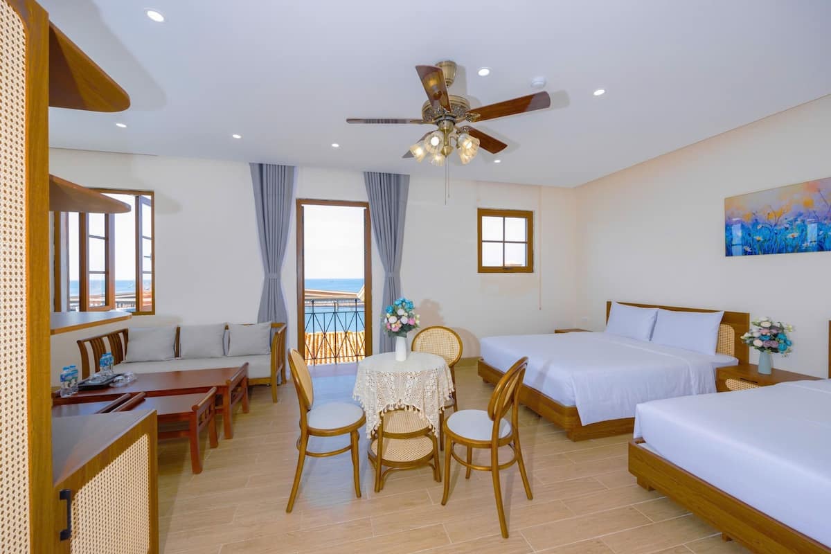 Family Room | Down comforters, minibar, desk, free WiFi