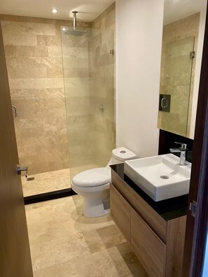 Shower, hair dryer, towels, soap