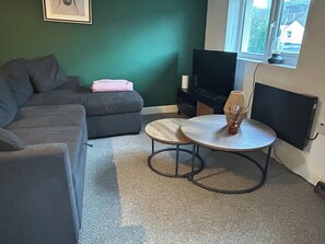 Apartamento Deluxe | Zona de estar