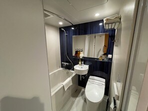 Separate tub and shower, hair dryer, towels, shampoo