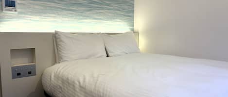 Small Double Room, Non Smoking | Down comforters, in-room safe, desk, blackout drapes