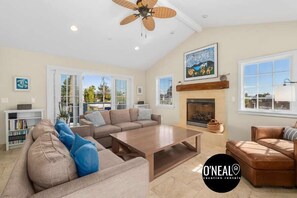 TV, fireplace, books, offices