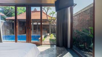 Deluxe Cottage, 1 Queen Bed, Non Smoking, Pool View | Free WiFi