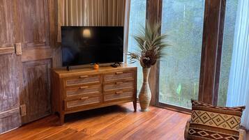 Deluxe Villa, Pool View | Minibar, in-room safe, desk, laptop workspace