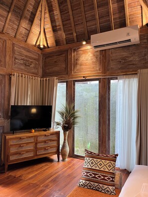 Deluxe Villa, Pool View | Minibar, in-room safe, desk, laptop workspace