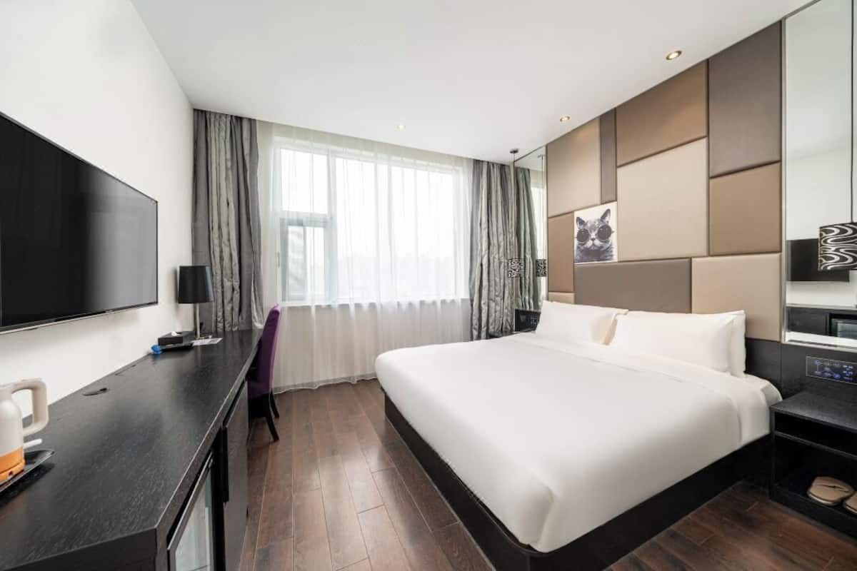Habitación doble superior | Ropa de cama hipoalergénica, minibar, escritorio y wifi gratis