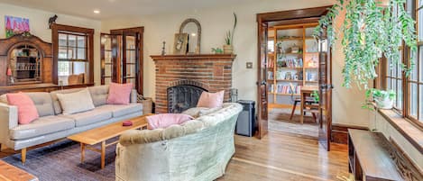 TV, fireplace, books