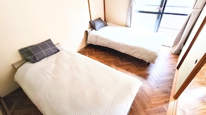 2 quartos, acesso à internet, roupa de cama