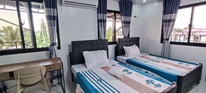Deluxe Apartment, 1 Bedroom, Balcony, Mountain View | Desk, laptop workspace, blackout drapes, iron/ironing board - Stay at Diez (Calamba)