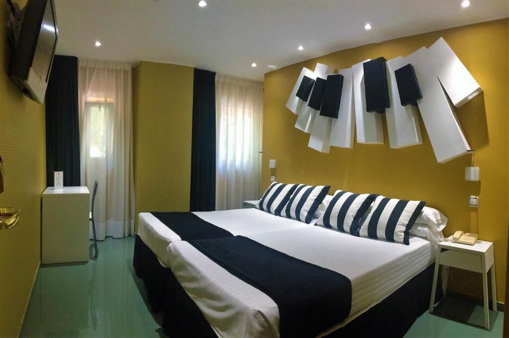 Egyptian cotton sheets, premium bedding, memory-foam beds, desk