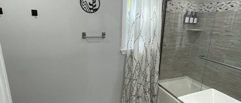 Hair dryer, towels, soap, shampoo