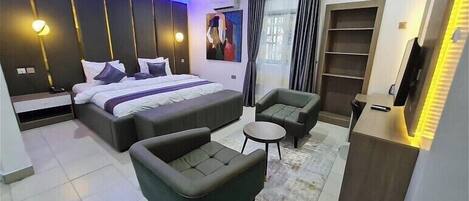 Economy Apartment, Balcony, City View | Desk, laptop workspace, blackout drapes, soundproofing