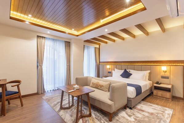 Junior Suite, Balcony, City View | Pillowtop beds, in-room safe, desk, laptop workspace