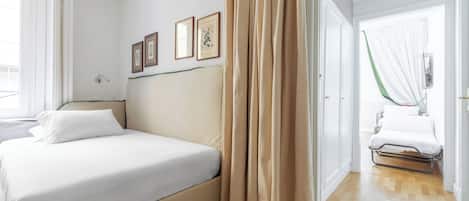 Suite Familiale | Minibar, coffres-forts dans les chambres, rideaux occultants