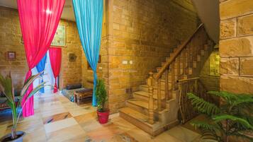 Deluxe Double Room, Balcony, City View | Living area