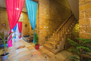 Deluxe Double Room, Balcony, City View | Living area