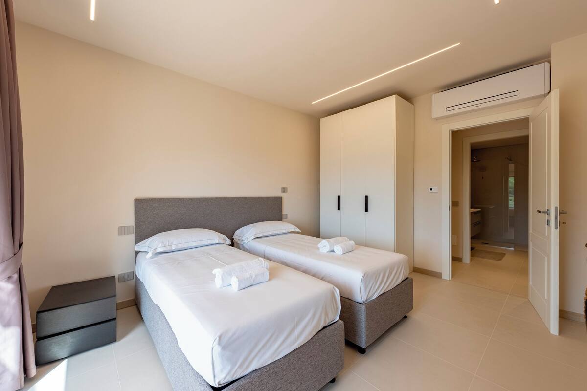 Family Apartment, 1 Bedroom, 2 Bathrooms, Mountainside (Relais Le Torri in Verici Baia) | 4 bedrooms, iron/ironing board, free WiFi, bed sheets